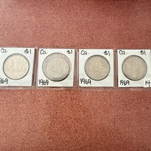 IN - (4) 1969 Canadian One Dollar Coins
