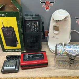 Radio, can opener, cassette player and