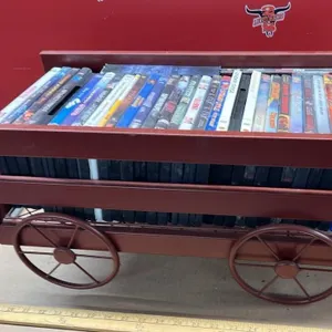 Decorative metal wagon w/DVD movies. *NO SHIPPING