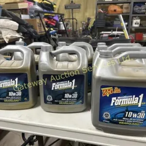 Three 5 L jugs of 10/30 oil and 4- four L jugs