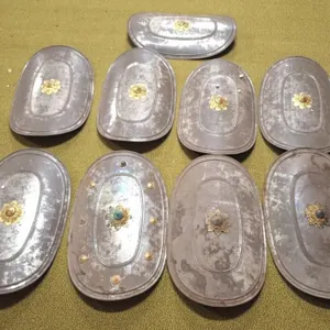 9 ceremonial tin shields