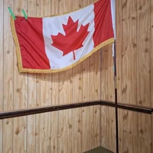 Canada flag with metal stand. 95" high
. Flag by