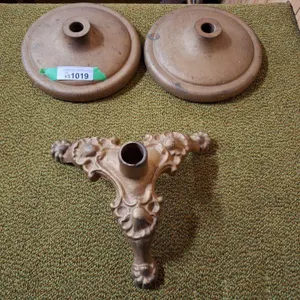 Trio of metal flag pole stands