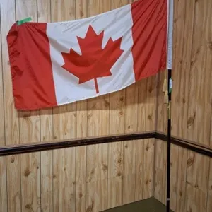 Canada flag with metal stand. 89" high