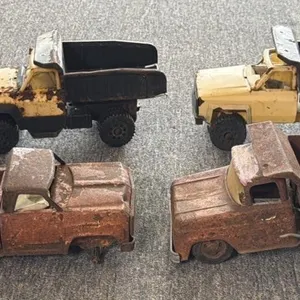 (4) Vintage Toy Trucks 14” and Smaller 
- all