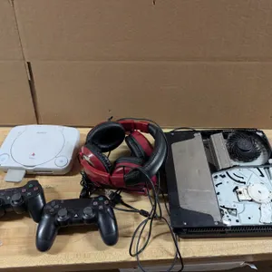 Lot of PlayStation Related Items (PS1 w/ Controller (no Cords/Not Tested)  Headphones, and PS4 w/ Co