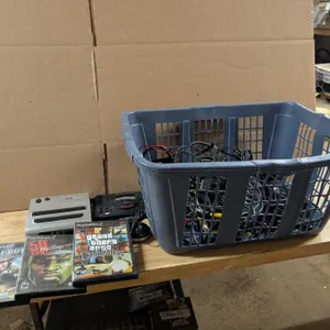 Lot of Misc. Cords, Bootleg Consoles, and (3) PS2 Games