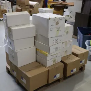 Pallet lot of envelopes,   Pallet was wrapped and stacked after lotting, previewing by photos only.