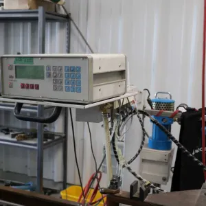 HHS Model C-1100 cold glue system currently being used on the folder/gluer in lot 108.