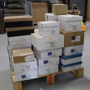Pallet lot of envelopes.   Pallet was wrapped and stacked after lotting, previewing by photos only.