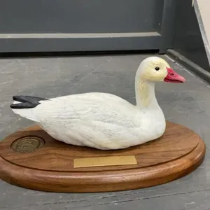 DUCKS UNLIMTED SASKATCHEWAN -  SMALL GOOSE ON WOOD BASE