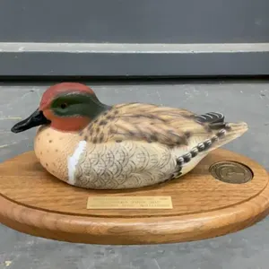 DUCKS UNLIMITED SASKATCHEWAN - SMALL DUCK ON WOOD BASE