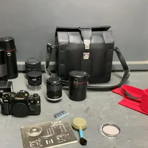 CANON FILM CAMERA W/ (3) EXTRA LENSES &  FLASH