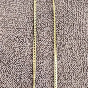 1115 - 15" gold chain.  Marked 10 kt. 4 grams