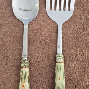 1118 - Temp-tations Old World serving spoon and flipper.  Stainless steel, ceramic handles.