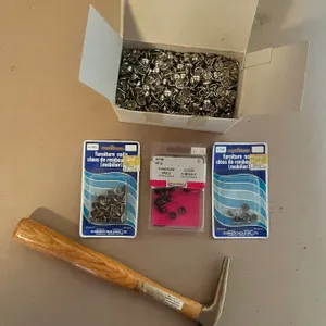 Furniture tack hammer, and assortment of furniture nails.