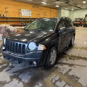 2009 JEEP COMPASS SUV, FWD, 2.9L 4 CYL, A/T, CLOTH, W/ FULL SET OF RECENT WINTER STUDDED TIRES, 279,500 KM SHOWING, S/N 1J4FT47A39D178928