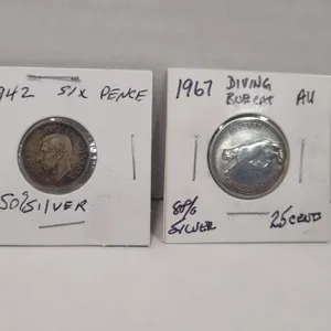 1867/1967 Silver Diving Bobcat Quarter, 1942 50 %