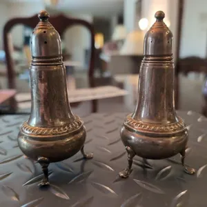 Empire Sterling salt & pepper shakers, inside is