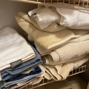 Shelf of towels and wash cloths