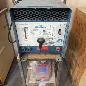 Miller Welder w/ Helmet & Rods **THIS ITEM SOLD LIVE ON-SITE ONLY, NOT FOR ONLINE BIDDING