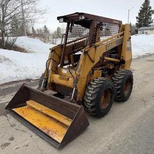 1985-1988 Case 1845C Skid Steer Loader w/ bucket