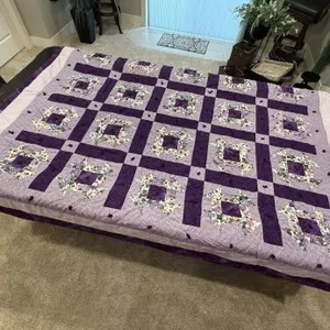 Purple Missouri Star tie quilt