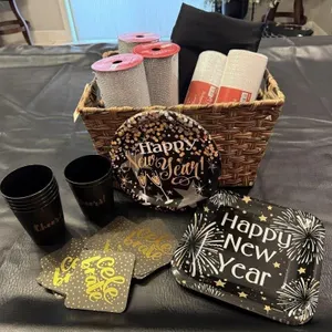 Basket, paper plates, napkins, mesh ribbon