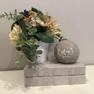 Storage books, floral bouquet, "Love" stone