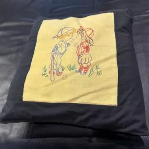 Embroidered throw pillow