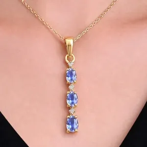$120, SILVER TANZANITE (0.9ct), CZ (0.05ct) PENDANT, retail value $120