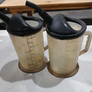 2  1 Gallon Fluid measuring container