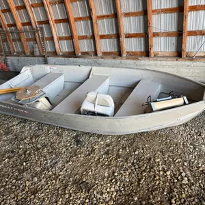 12ft PrinceCraft Aluminum Boat - Comes with electric motor, and 9hp Johnson motor