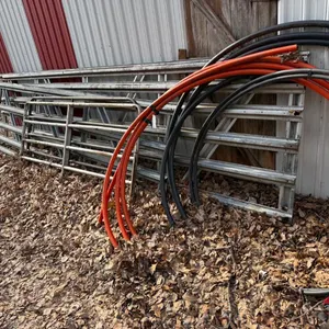 Gates and Plastic Pipe Behind Shed