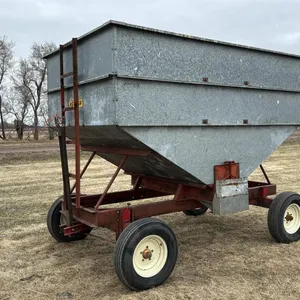 Kendon approx 250bus.  Galvanized gravity box on 4-wheel farm wagon