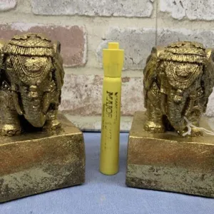 PAIR OF GOLD GILT STYLE ELEPHANT BOOKENDS BY