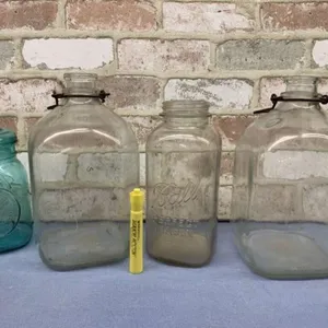 4 VINTAGE JARS - 2 GALLON MILK JARS,
