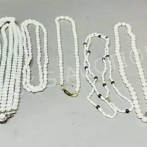 collection of various pearl necklaces