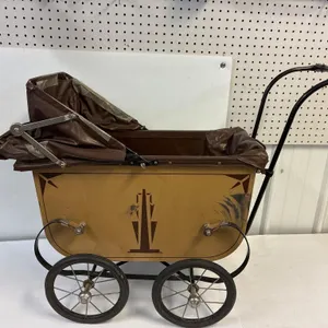 Antique metal doll carriage