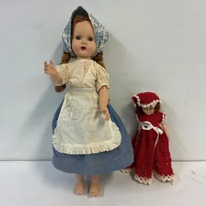 2 vintage dolls.