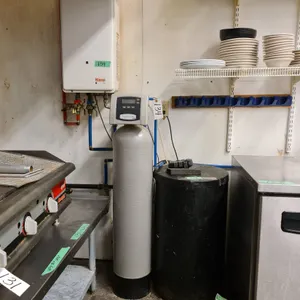 Rinnai Tankless Water Heater with Impression Series Water Softener and Brine Tank