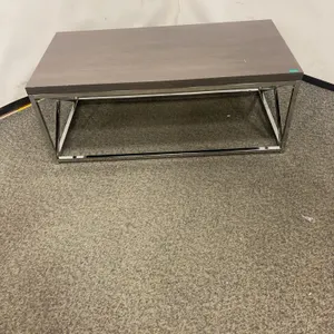 Coffee table 22"d x 44"w x 17"h Scratch on Surface, Chips on edge