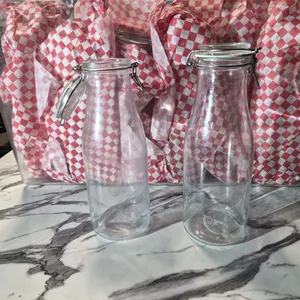 (18) Ikea 1 Liter Decanters with Locking Lids, (1) Cambro 22 Gallon Clear Storage Container - Mod...
