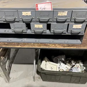 Metal hardware cabinet and miscellaneous plumbing parts