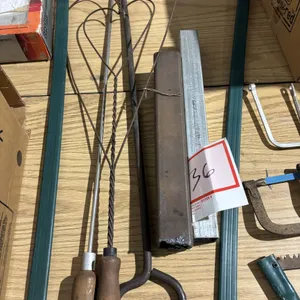 Coal Stoker, rug beater, hook, and square pipe