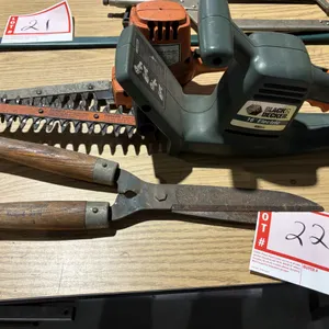 Pair of hedge, trimmers and hand trimmers