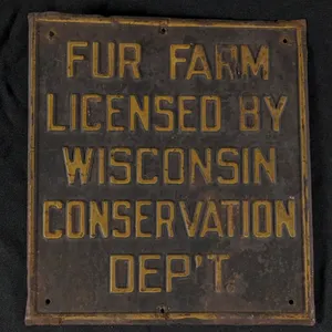 EMBOSSED TIN SIGN FUR FARM LICENSED BY WISCONSIN CONSERVATION DEP'T