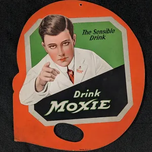 1925 CARDSTOCK FAN PULL SIGN OR HAND FAN DRINK MOXIE