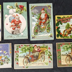 7 ANTIQUE BICYCLE & MOTORCYCLE SANTA CLAUS CHRISTMAS POST CARDS