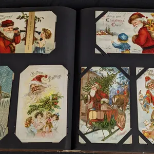 INCREDIBLE POST CARD ALBUM CONTAINING 300 +/- SANTA CLAUS CHRISTMAS POST CARDS